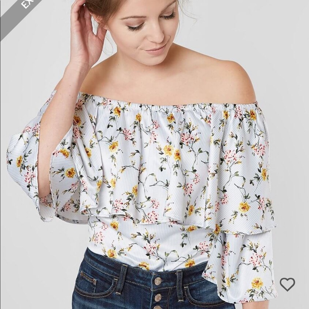 Gimmicks off shoulder top